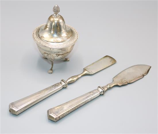 A pair of French silver fish servers and an 800 standard vase and cover